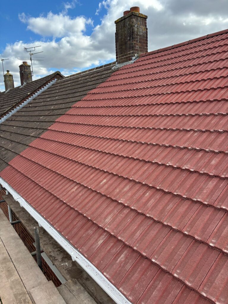 This photo shows a roof in Surrey before spray foam removal started.