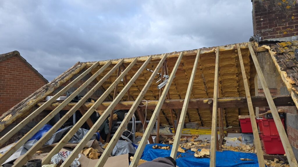 This is a photo of completed roof spray foam removal job in Surrey.